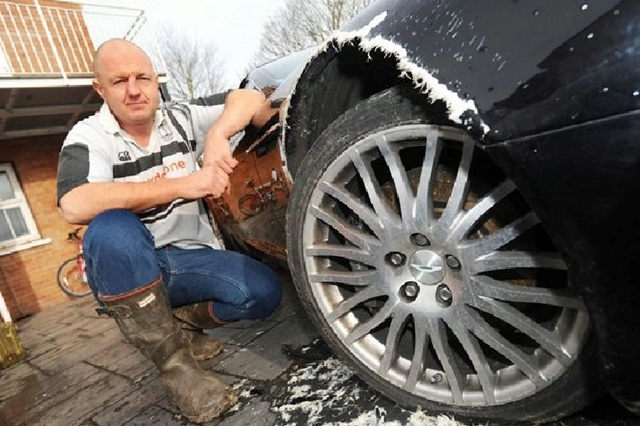 Dog chews Hole through Wheel Arch of Owner's  Aston Martin DB9 Volante