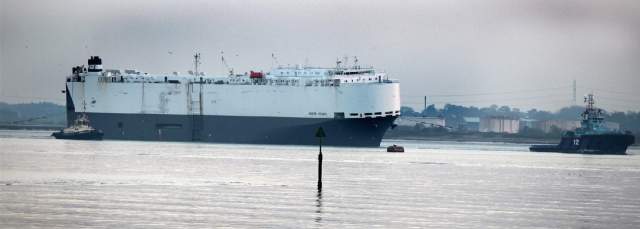 Listing car transporter Hoegh Osaka is towed into Southampton - picture by Malcolm Nethersole
