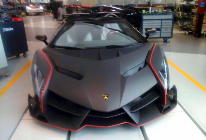 Matte carbon Lamborghini Veneno Roadster front