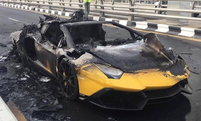 Yellow Lamborghini Aventador burning