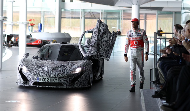 Jenson Button Arrives at MP4-28 Unveiling in McLaren P1 Prototype