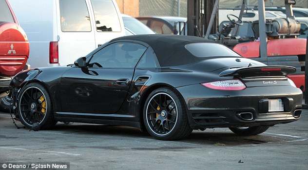 Chris Brown Crashes Porsche 911 Turbo S Cabrio While Evading Paparazzi