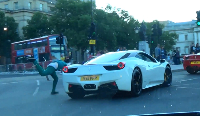 Video: Drunk Man Falls Over Chasing Supercars